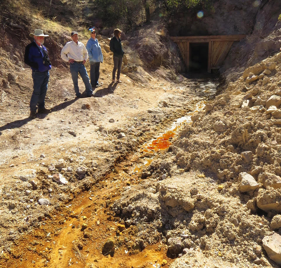 Orange sludge draining from the Lead Queen Mine